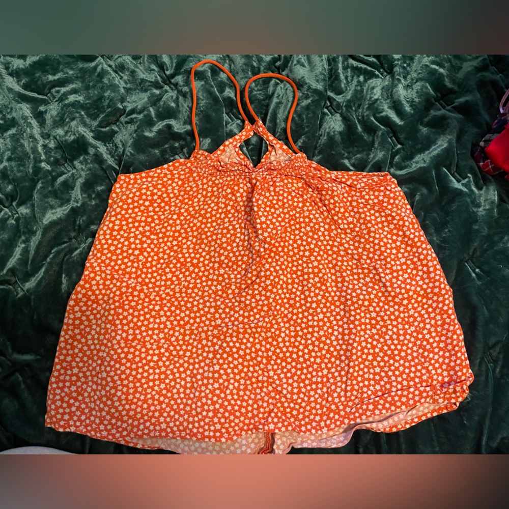This is a orange crop top, size x-small (1).